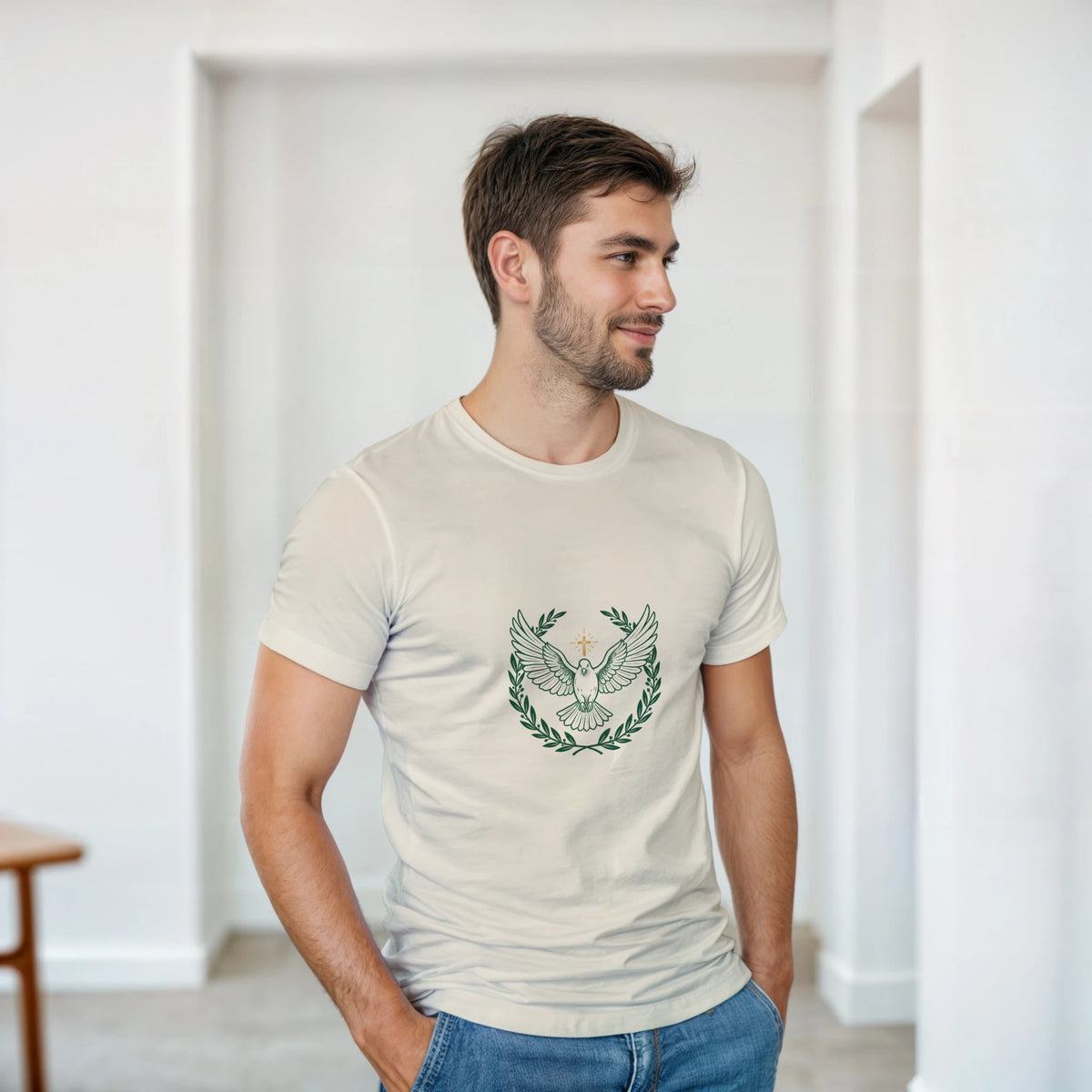 Cream t-shirt with a dove with wings spread inside an olive branch wreath below a cross