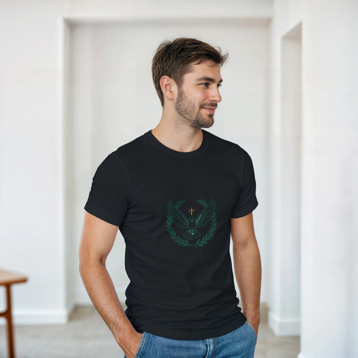 Black t-shirt with a dove with wings spread inside an olive branch wreath below a cross