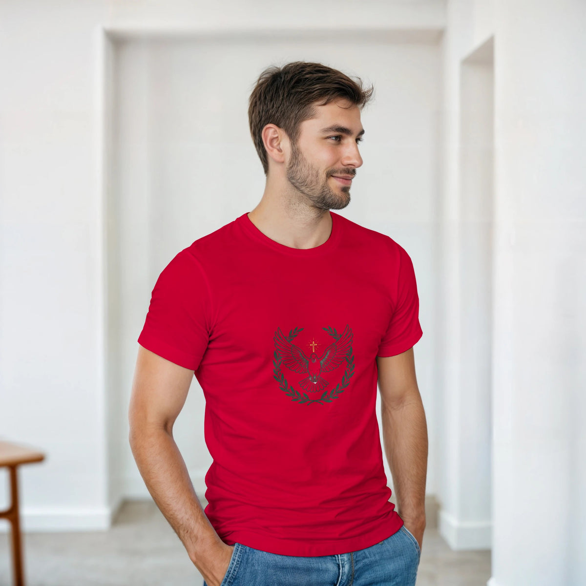 Red t-shirt with a dove with wings spread inside an olive branch wreath below a cross